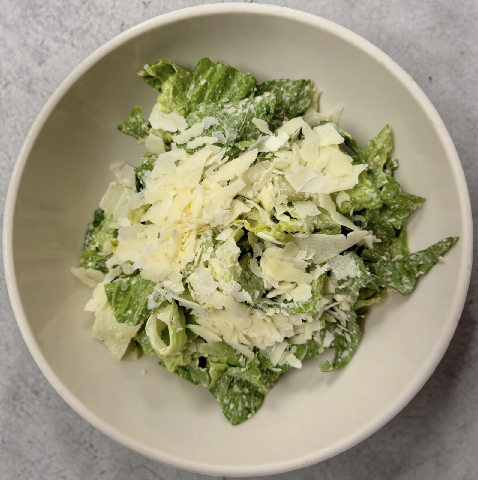 Caesar salad with romaine, asiago, and Parmigiano Reggiano