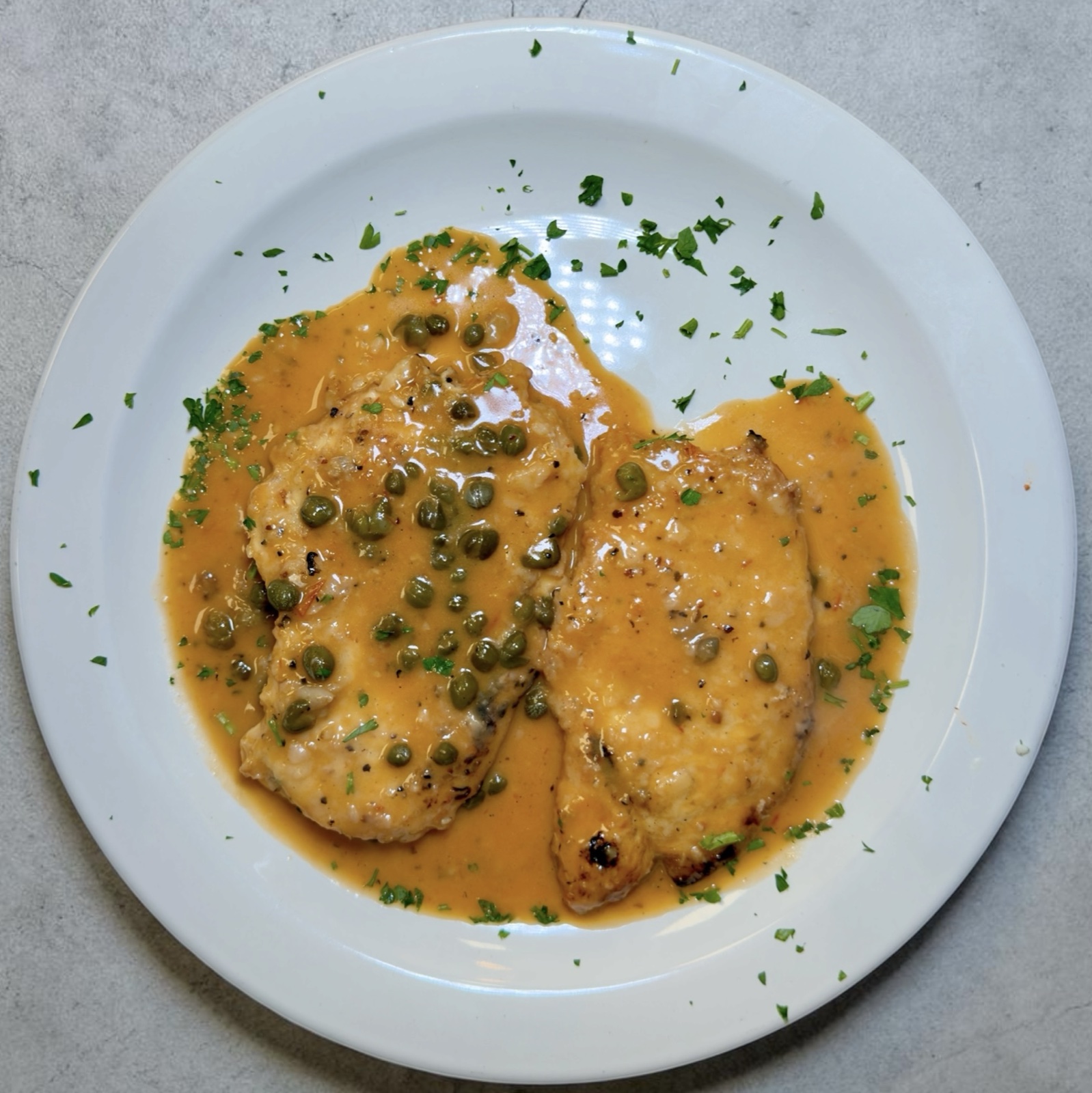 Chicken piccata in lemon white wine caper sauce