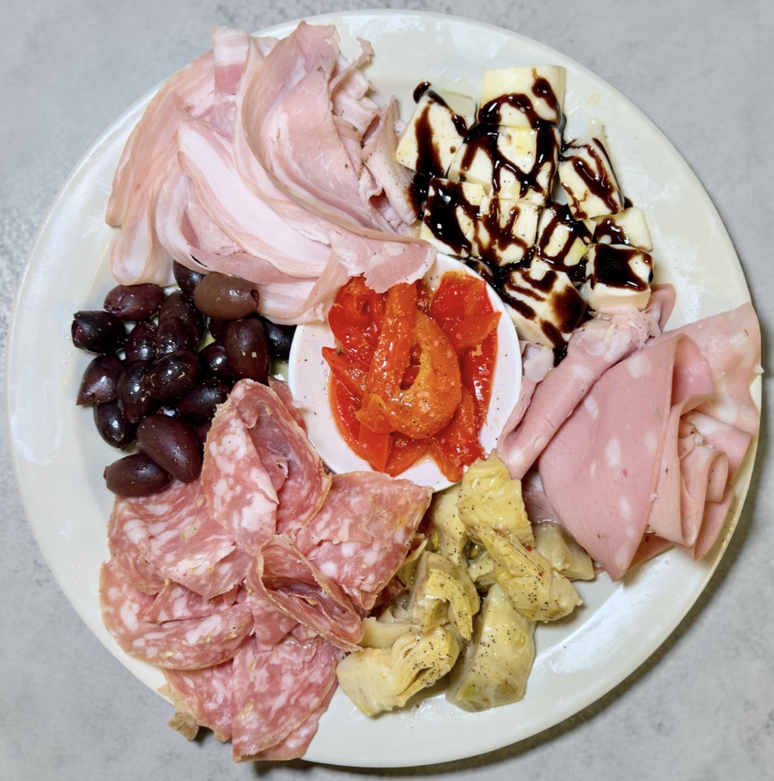 Sophia's Italian antipasto with porchetta, mortadella, salami, and pearl mozzarella