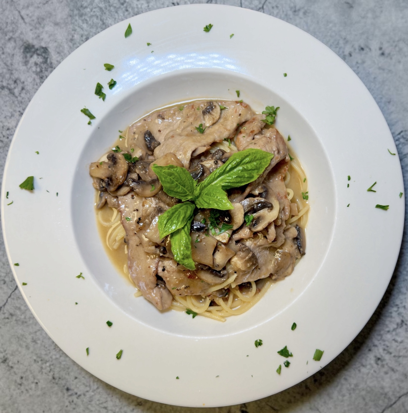 Veal marsala over spaghetti